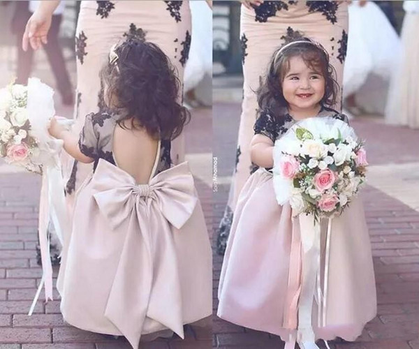 Cute Little Flower Girls Dresses Lace Aplliques Backless Saudi Arabic Short Sleeves Tea Length with Big Bow Kids Peagent Dresses