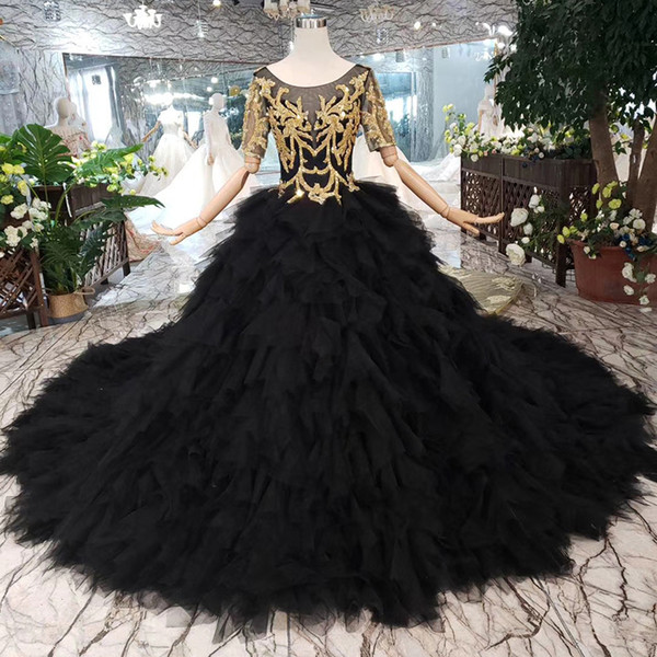 2022Newest Design Luxury Evening Dresses Shining Gold Sequins Applique Evening Gowns Illusion Short Sleeve Backless Black Swan Prom Dresses