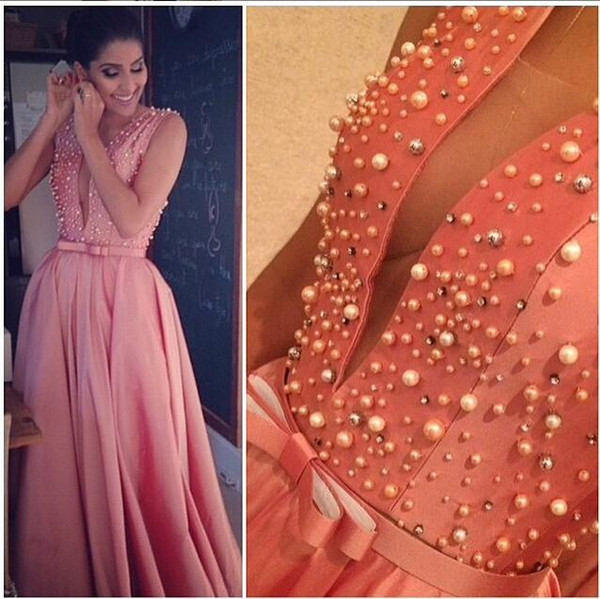 Sexy Coral Arabic Formal Evening Party Dresses V Neck Floor Length Pearls Occasion Celebrity Prom Bridal Gowns Cheap 2016 Bow Sash Custom