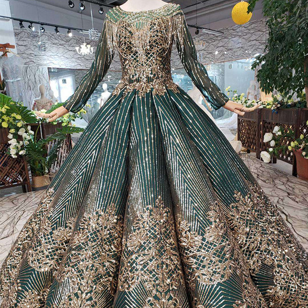 2022Newest Design Dubai Prom Dresses Long Tulle Sleeve Gold Exquisite Applique Party Gowns O Neck Open Keyhole Back Beaded Evening Gowns