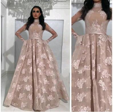 2017 Sexy Ball Gown Prom Dresses High Neck Long Sleeves Appliqued Nude Evening Gowns with Fixed Overskirt and Belts Sheer Pageant Dresses