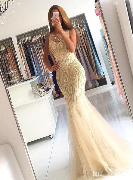 Champagne 2017 Sexy Mermaid Prom Dresses Sheer Neck Beaded Crystals Illusion Back Sweep Train Formal Evening Party Gowns Custom Made