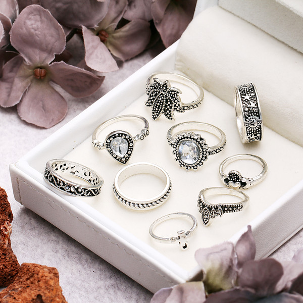 Lovely Creative 9 piece joint ring set with lotus cross ring