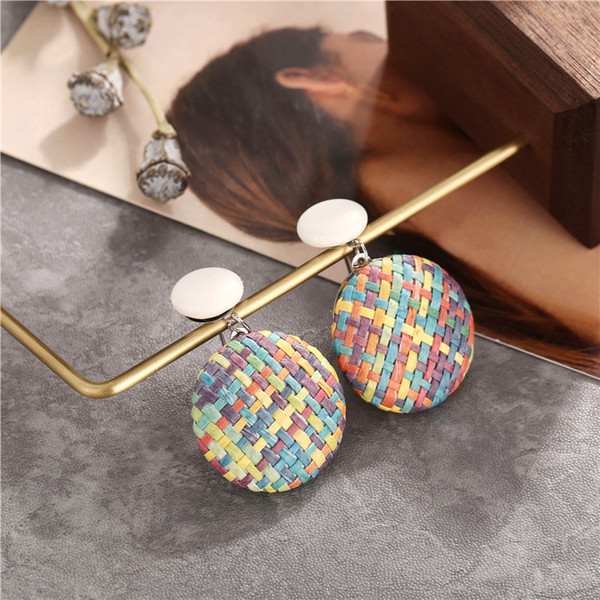 Simple color woven round ear stud