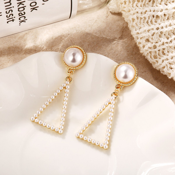 Pearl geometric earrings are elegant and retro