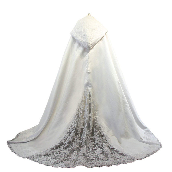 A lady's gown with lace wedding dress and hat with a long tail and a fringe wedding