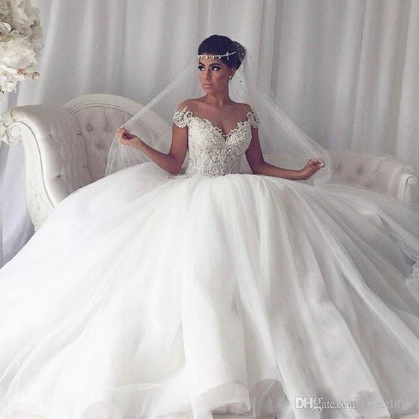 Elegant Sheer Jewel Neck Wedding Dresses Short Sleeve Puffy Tulle A Line Bridal Gown Custom Made For Church Style