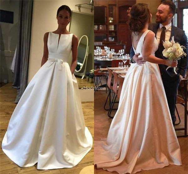 Gorgeous Wedding Dresses Jewel Neck Bow Backless A Line Sweep Train Simple Castle Bridal Gowns Pockets Elegant Church Vestidoe De Noiva