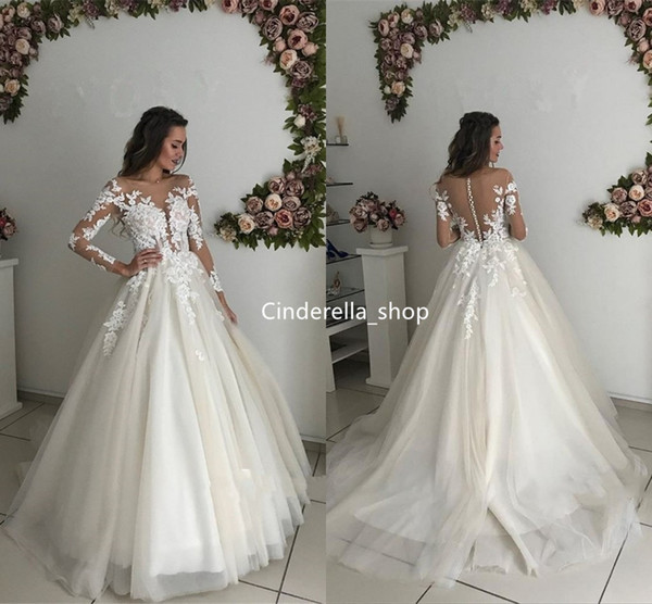 Amazing Champagne Arabic Wedding Dresses With Long Sleeves Lace Appliques See Through Buttons Back Sweep Train robes de mariée