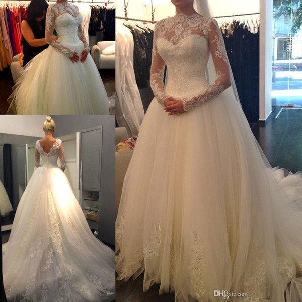 Sexy New Sheer Lace Long Sleeves Backless A-Line Wedding Dresses High Neck Tulle Applique Beaded Court Train Bridal Gowns