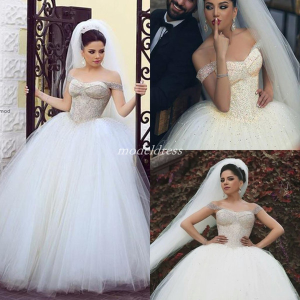 Arabic Crystal Ball Gown Wedding Dresses Off Shoulder Backless Sweep Train Chapel Garden Country Bridal Gowns vestido de novia Plus Size