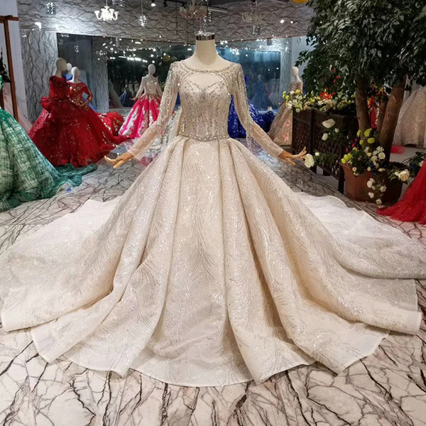 Luxury Crystal Wedding Dress Royal Train O-Neck Illusion Long Sleeve Shiny Tassel Bride Dress Wedding Gown Dubai 2022Newest Fashion Design