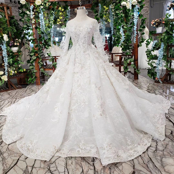 2022Latest Feather Wedding Dresses Long Tulle Sleeve Covered Button Illusion Back O-Neck Shining Sequins Crystal Applique Wedding Gowns