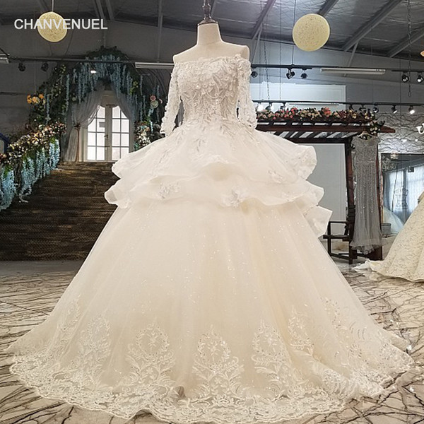 Latest Bohemian Bateau Neck Wedding Dresses Long Tulle Sleeve Lace Up Back 3D Floral Applique Cascading Ruffles Beach Bridal Gowns