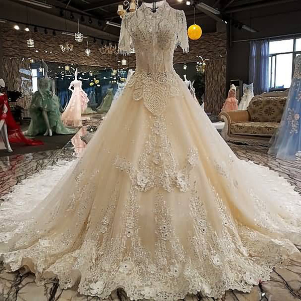 2022Bohemian Backless Wedding Dresses Tassel Short Sleeve Lace Up Back 3D Floral Applique Shining Crystal Sequins High Garden Bridal Gowns