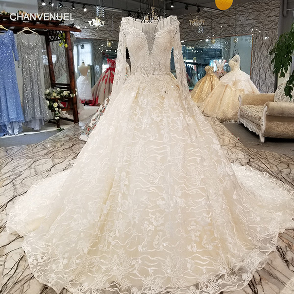 2022Bohemian Illusion Deep V Neck Wedding Dresses Long Tulle Sleeve Open Keyhole Back Shining Sequins Crystal Hand Made Flower Bridal Gowns