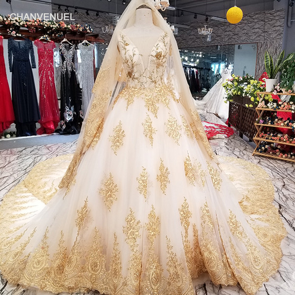 2022Latest Muslim Long Tulle Veil Wedding Dresses Sleeveless Illusion Deep V Neck Shining Crystal Sequins Gold Pattern Applique Bridal Gown