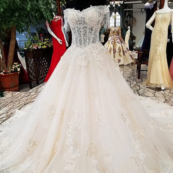 2022Tassel Short Sleeve Wedding Dresses Lace Up Back Sweetheart Neck 3D Floral Applique Pattern Sequins Crystal Classic Garden Bridal Gowns