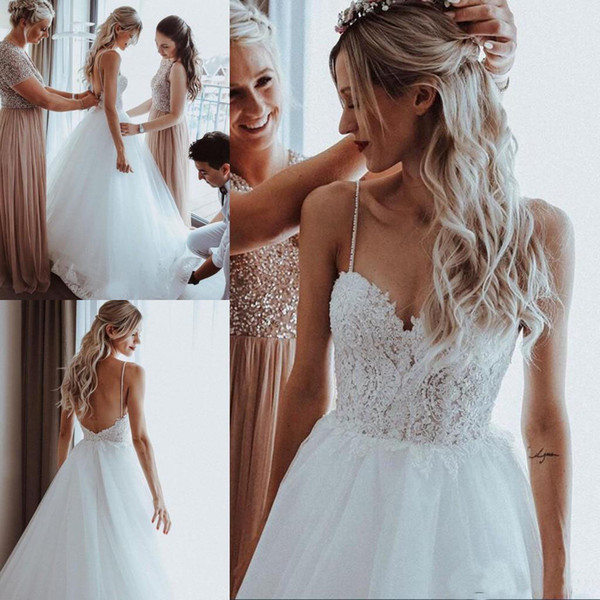 Elegant Beaded Pearls Tulle A Line Boho Wedding Dress Spaghetti Strap Sweep Train Bridal Gowns Sexy Backless Sleeveless Beach Wedding Gowns