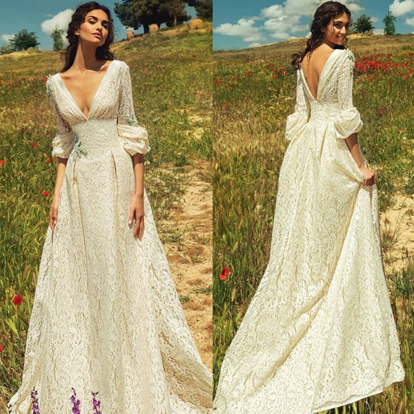 New Romantic Bohemian Lace Backless Wedding Dresses V neck Long Sleeves Garden Beach Bridal Gowns Fairy Sweep Train 1970s Hippie Boho