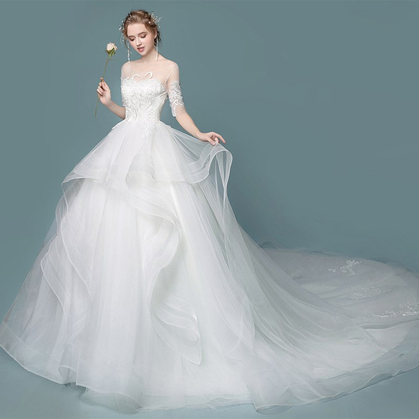 New Layer Ruffle Skirts Backless Wedding Dresses Illusion Long Sleeves Appliqued Ball Gowns Bridal Wedding Gowns DH412