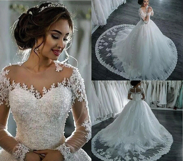 Amazing Sheer Neck Wedding Dresses Lace Appliques Beads Illusion Long Sleeves Bridal Gowns Ball Gown Sweep Train Custom Made Wedding Dresses