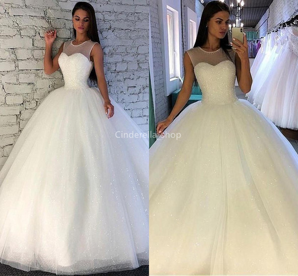 Charming A-Line Tulle Illusion Beaded Neck Sleeveless Sequined Saudi Arabic Mariage Dresses Custom Made Garden Bridal Gowns vestidos