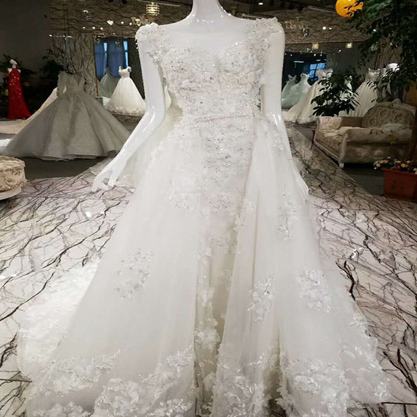 2022Sexy Bohemian Sleeveless Wedding Dresses Illusion Deep V Neck Backless Hand Made 3D Floral Applique Shining Crystal Wedding Gowns