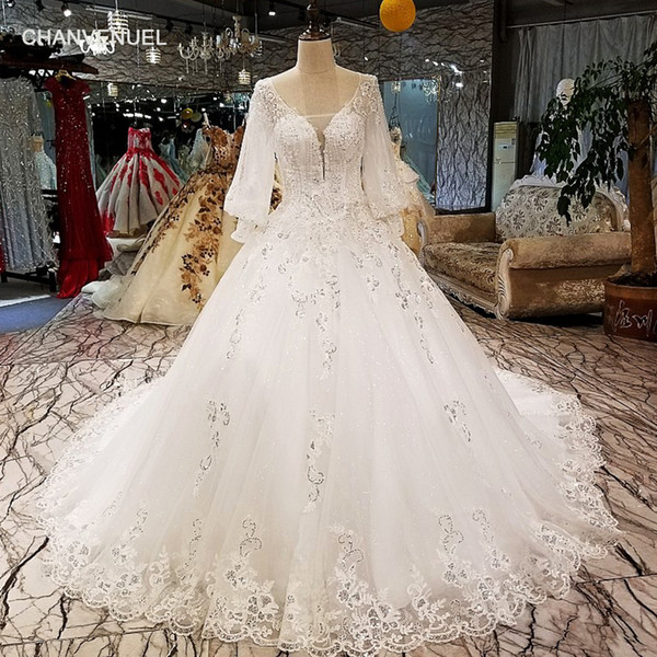 2022Lebanon Shining Sequins Wedding Dresses Long Tulle Sleeve Open Keyhole Back Illusion Deep V Neck Patterns Applique Garden Bridal Gowns