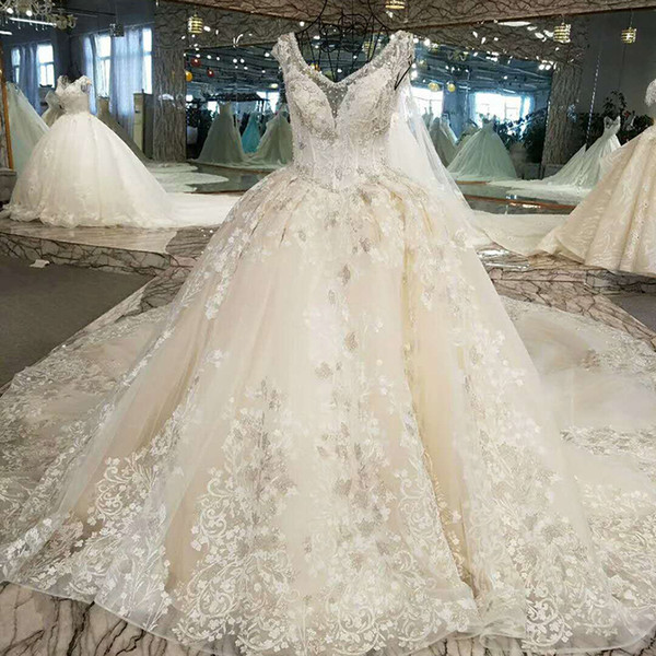 2022Latest Luxury Crystal Wedding Dresses Illusion Deep V Neck Sleeve Backless Hand Made 3D Floral Applique Pattern Garden Wedding Gowns