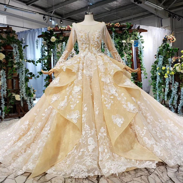 2022Dubai Luxury Wedding Dresses Long Tulle Sleeve Illusion O Neck Lace Up Back Cascading Ruffles Sequins Crystal Bridal Gowns Garden New