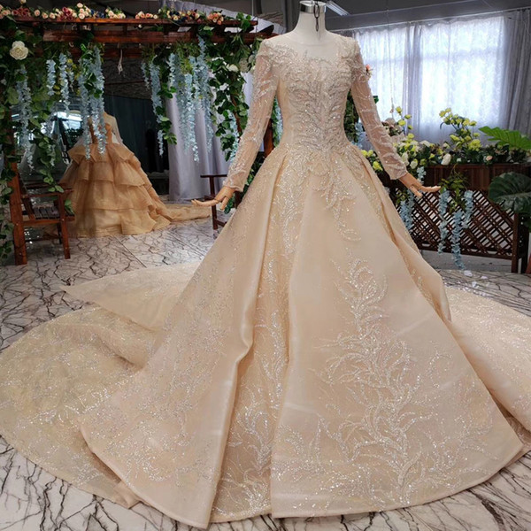 2022Muslim Latest Wedding Dresses Illusion O Neck Long Tulle Sleeve Open Keyhole Lace Up Back Sequins Crystal Lace Applique Bridal Gowns