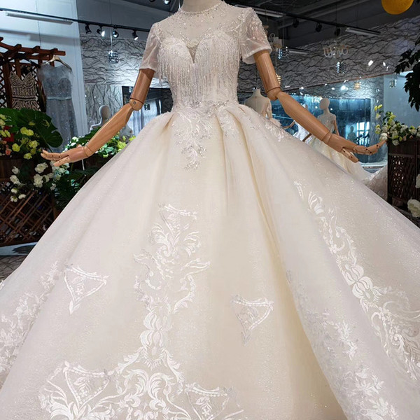 2022Newest Design Lebanon Wedding Dresses Illusion O Neck Tulle Short Sleeve Wedding Gowns Lace Up Back Shining Beaded Tassel Bridal Gowns