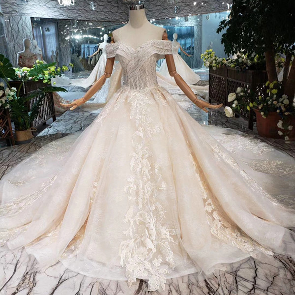 2022Newest Design Lebanon Wedding Dresses Sexy Sweetheart Neck Short Sleeve Wedding Gowns Shining Sequins Applique Garden Bridal Gowns