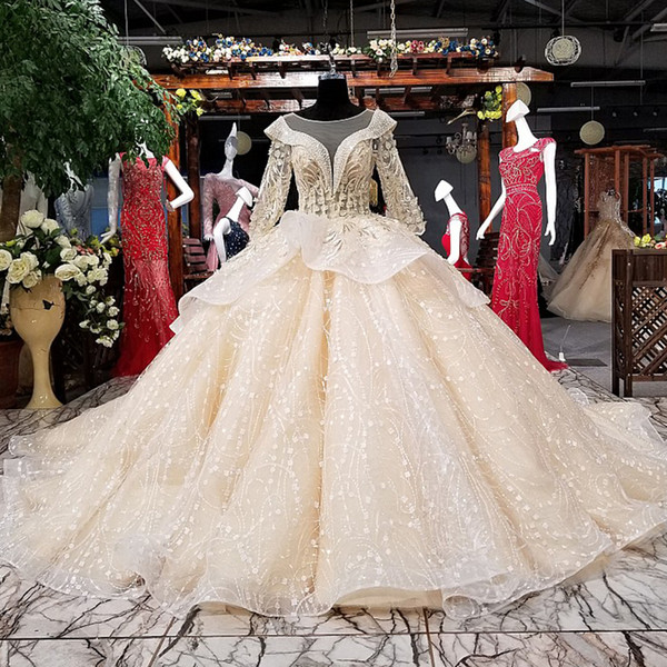 2022Latest Luxury Saudi Arabia Wedding Dresses Illusion Deep V Neck Long Tulle Sleeve Open Keyhole Back 3D Applique Fur Garden Bridal Gowns