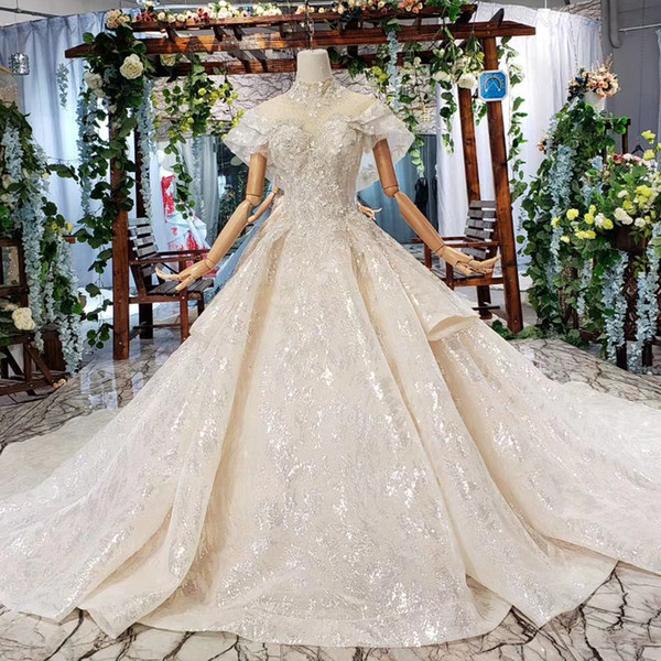 2022Latest beach wedding dresses Crystal Illusion High Neck Cap Sleeve Lace Applique Cascading Ruffles wedding dresses bridal gowns Garden