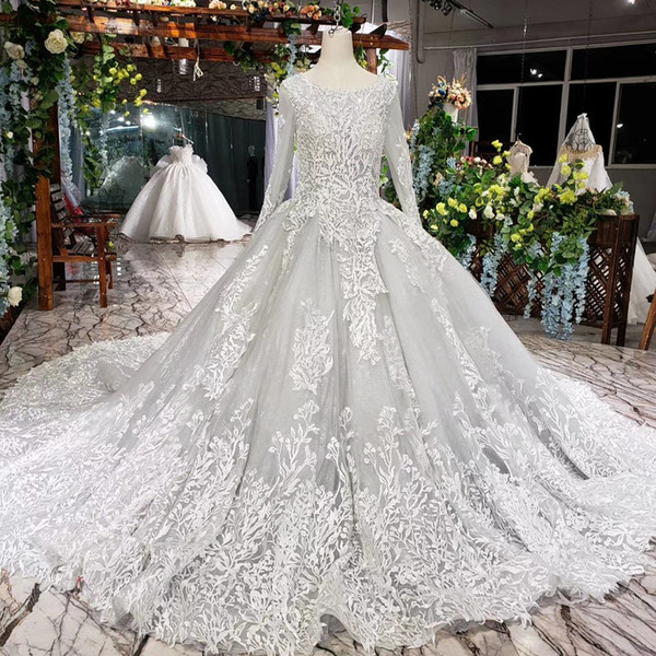 2022Luxury lace wedding dresses Long Tulle Sleeve Lace Up Back O Neck Pearl Crystal Applique Pattern Latest boho wedding dresses Garden New