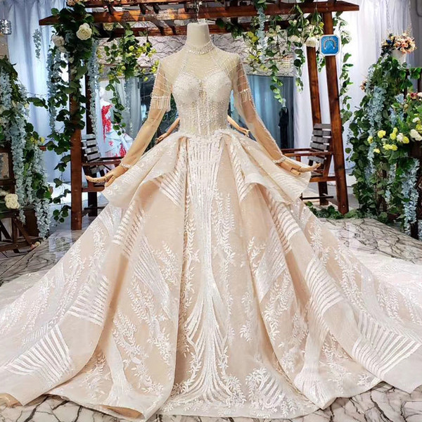 2022Latest boho wedding dresses Tassel Long Tulle Sleeve Illusion High Neck Ruffle Open Keyhole Back Crystal Sequins cheap wedding dresses