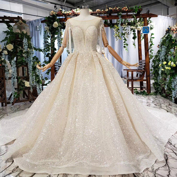 2022lace wedding dresses Illusion O Neck Tassel Beaded Short Sleeve Open Keyhole Back Sequins Crystal Lebanon ball gown wedding dresses New