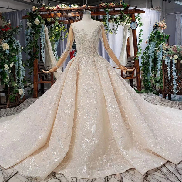 2022latest cheap wedding dresses illusion o neck long tulle sleeve open keyhole back shining crystal sequins beaded wedding dresses garden