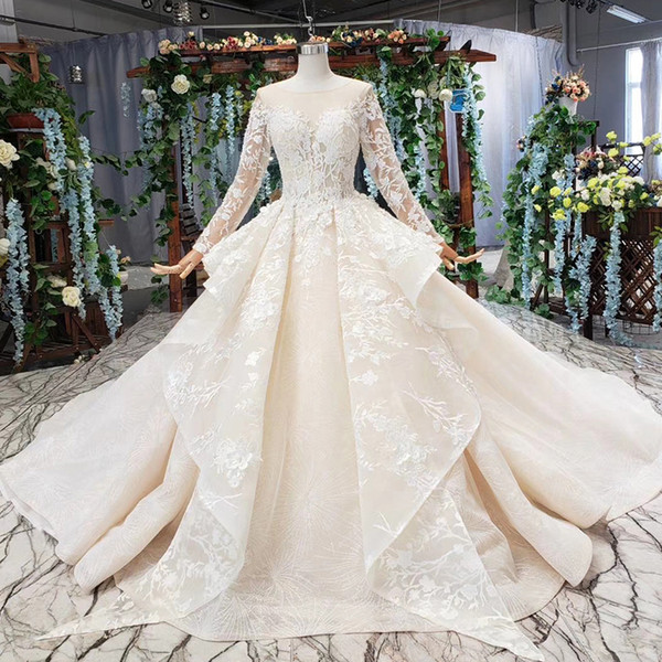 2022Summer Lebanon Wedding Dresses Long Tulle Sleeve Illusion O Neck Open Keyhole Lace Up Back Hollow Applique Ruffle Crystal Bridal Gowns