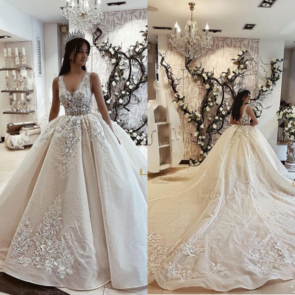 Saudi Arabic Dubai Style Princess Ball Gown Wedding Dresses Backless V Neck Appliques Court Train Bridal Gowns Plus Size