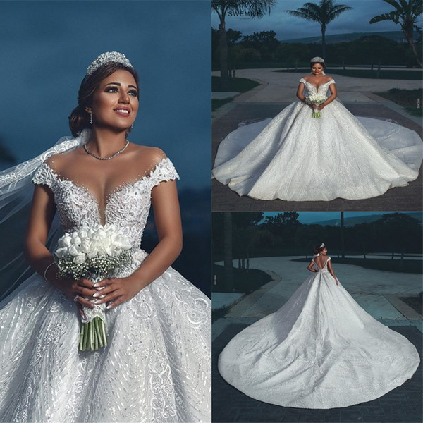 Luxury Arabic Ball Gown Wedding Dresses Elegant Off Shoulder Beads Appliques 3D Designed Sexy Backless Long Train Bridal Gowns