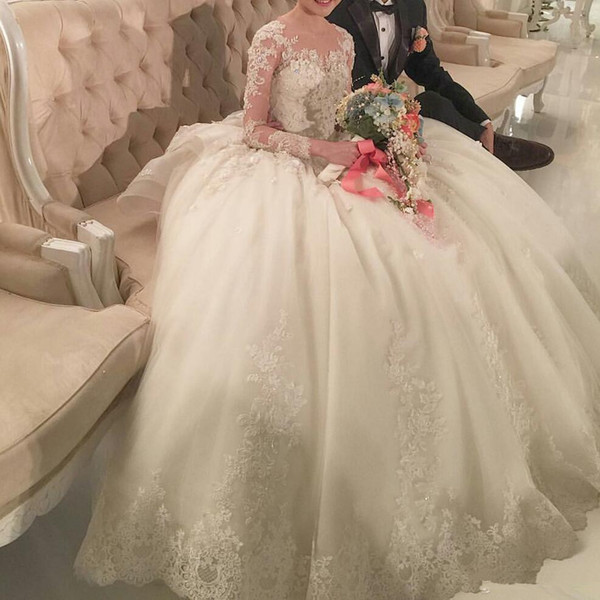 Gorgeous Ball Gown Wedding Dresses with Cathedral Train Jewel Neck Long Sleeves 3D Floral Appliques Ruffles Elegant Bridal Gowns