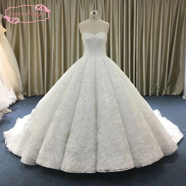 2018 Ball Gown Wedding Dresses Real 2018 Sweetheart Neckline Lace Appliques Beading Pearls Bling Bling Puffy Bridal Dresses Gowns