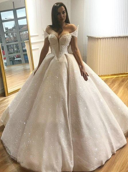 Gorgeous Sparkly Luxury Wedding Dresses Ball Gown Off the Shoulder Pearls Beading Sparkly Sequins Tulle Satin Lining Fashionable Bridal Gown