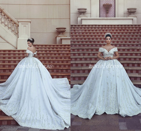 Royalty Lace Ball Gown Wedding Dresses Off Shoulder 3D Flowers Backless Court Train Chapel Garden Bridal Gowns Dubai vestido de novia