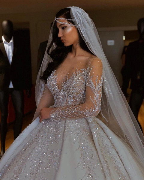 Luxurious Sparkly African Wedding Dresses Sheer Neck Long Sleeves Bridal Dresses Beaded Sequins Satin Wedding Gowns