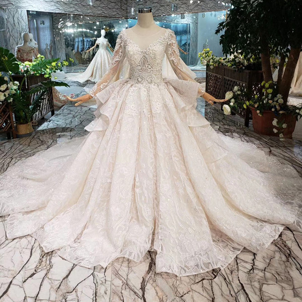 2022Newest Design Turkish Wedding Dresses Long Tulle Sleeve Illusion O Neck Wedding Gowns Cascading Ruffles Lace Up Back Garden Bridal Gown