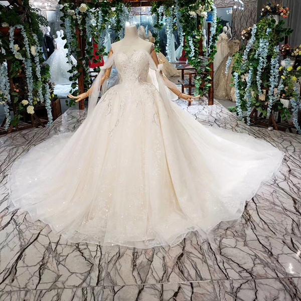 2022Latest Bohemian Wedding Dresses Long Lace Shawl Illusion O Neck Sleeve Backless Lace Up Back Sequins Applique Pattern Beach Bridal Gown
